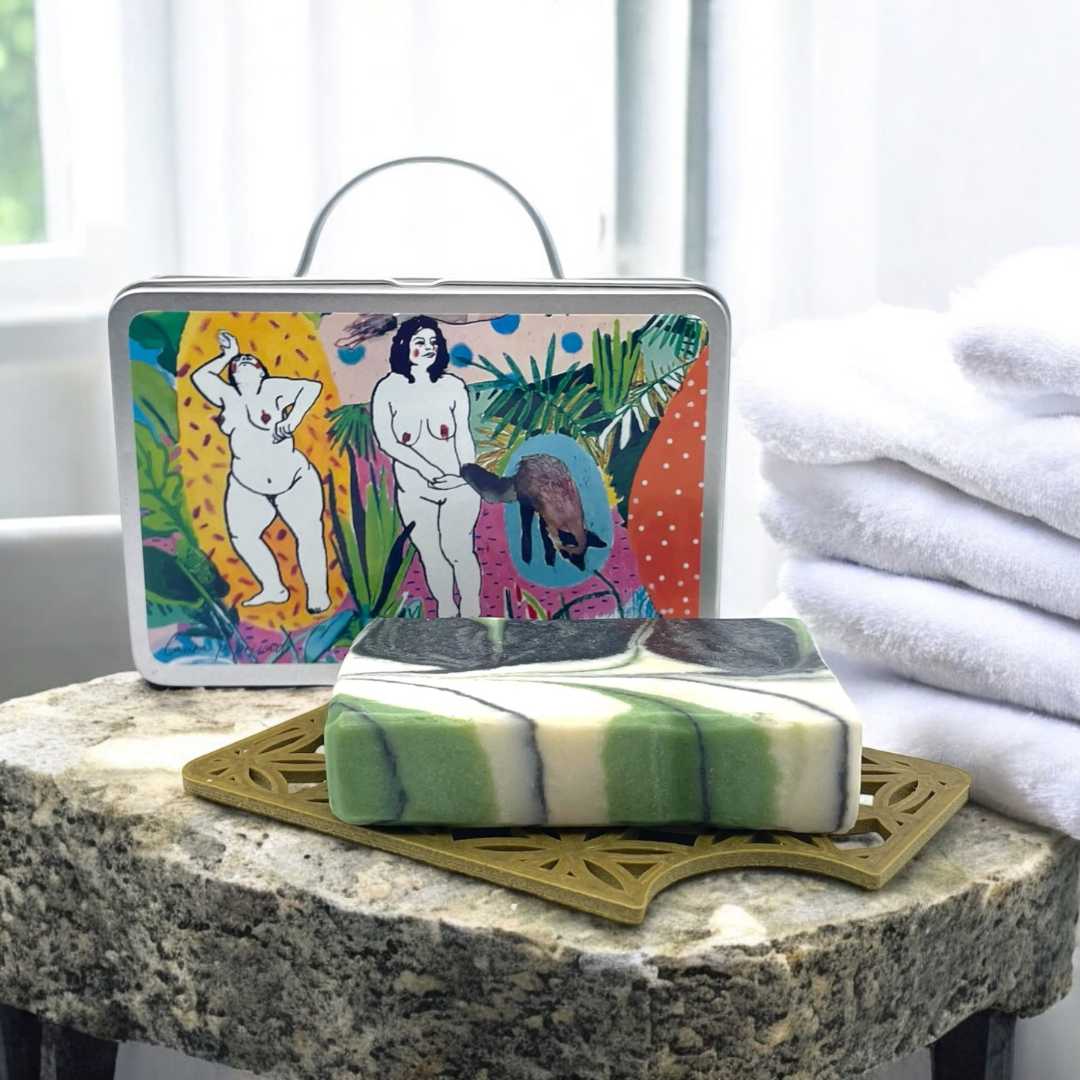 Travel soap box in the shape of a suitcase. Illustrated by Laura Privado